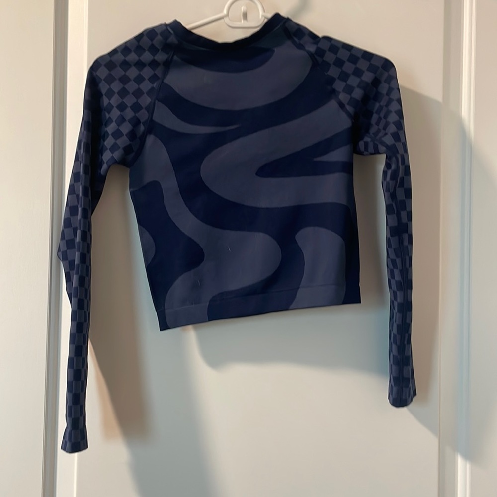 Fabletics blue long sleeve yoga top.